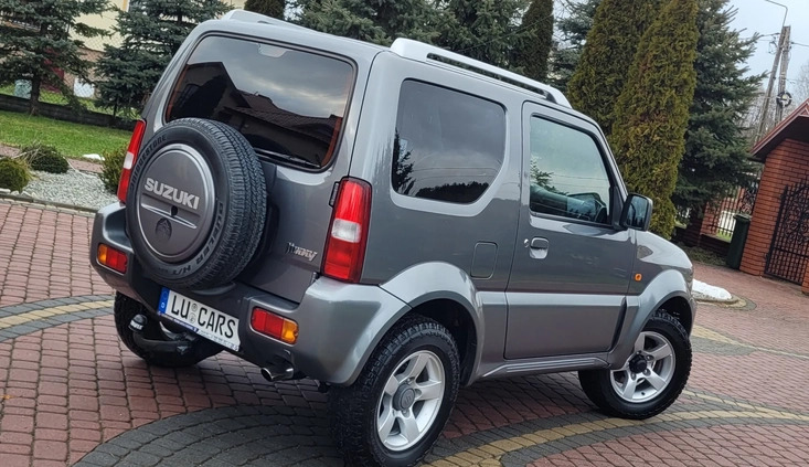 Suzuki Jimny cena 32900 przebieg: 146000, rok produkcji 2006 z Międzyzdroje małe 704